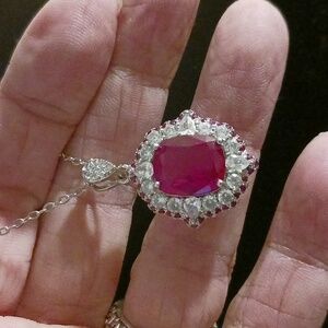 New! Lab created blood red garnet with white topaz!